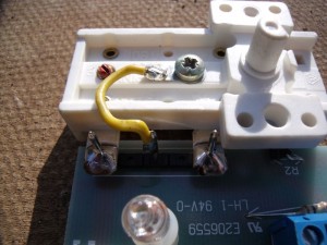 GB7WB Thermostat with yellow wire attached to new screw which provides new N/O contact